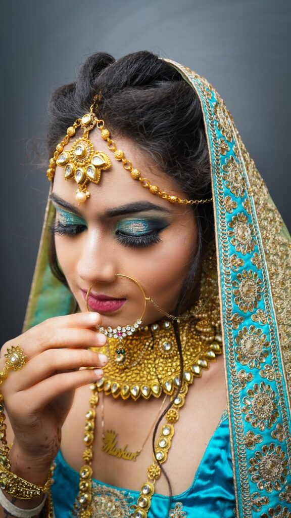 A stunning portrait of an Indian bride adorned with exquisite jewelry and traditional attire.